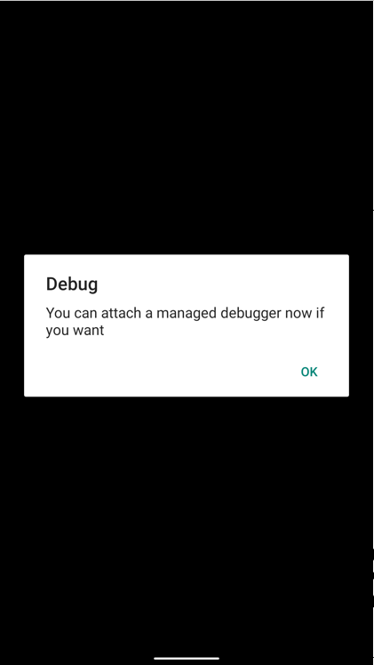 Screenshot from phone showing message to wait for debugger